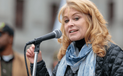 Stacy Garrity, standing in solidarity with Trump, is invited to the State of the Union