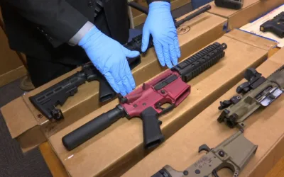 2 top US gun parts makers agree to temporarily halt sales in Pennsylvania