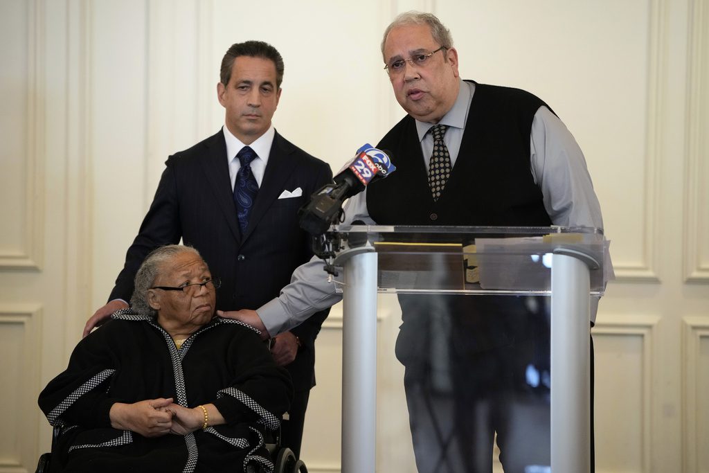 Sam Lemon, right, speaks during a news conference with Susie Williams Carter, center, and lawyer Michael Pomerantz, Monday, May 20, 2024, in Philadelphia. Carter is the sister of the youngest person ever executed in the state of Pennsylvania, Alexander McClay Williams, 16, and Lemon is the great-grandson of the attorney who represented him. Carter is suing the county where the Black teenager was convicted in 1931. The suit comes two years after Williams' conviction by an all-white jury was vacated.