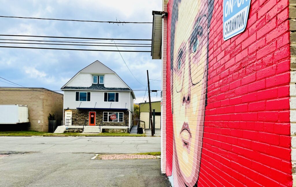 The exterior of Retro Cafe and a mural of Dwight Schrute. Retro Cafe is one of Scranton's best new restaurants.