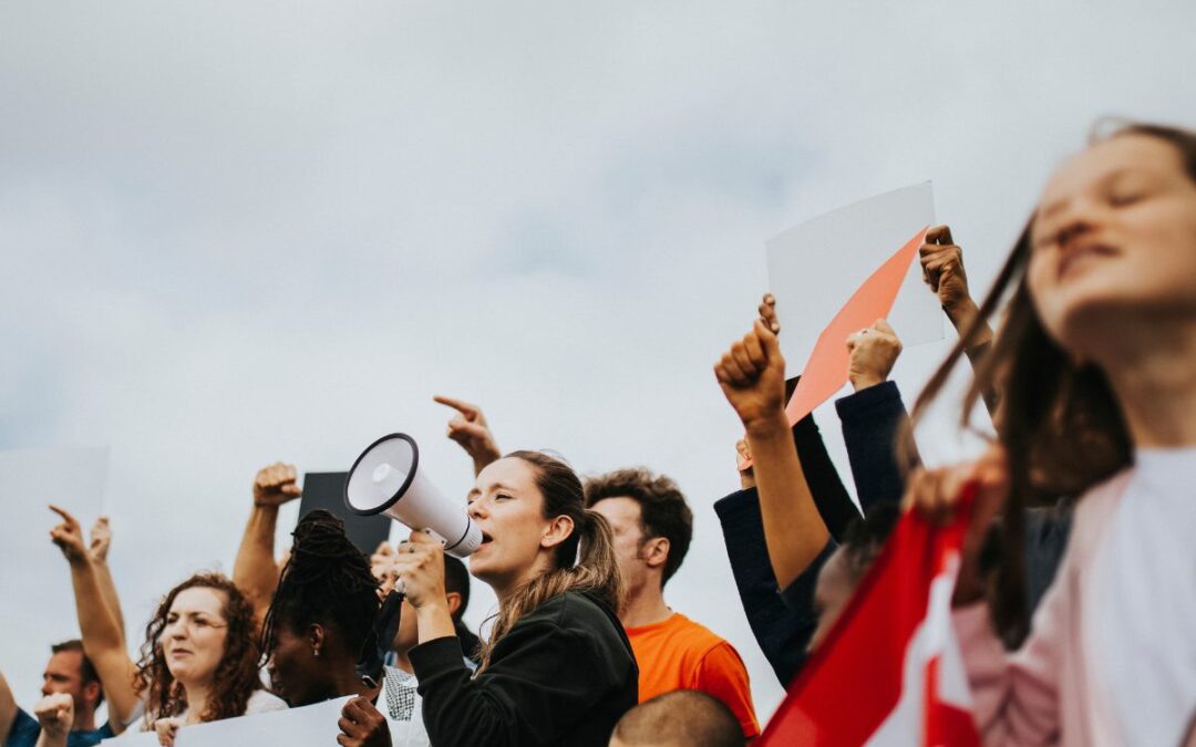 A group of youth protesting as a powerful act of civic engagement beyond the ballot
