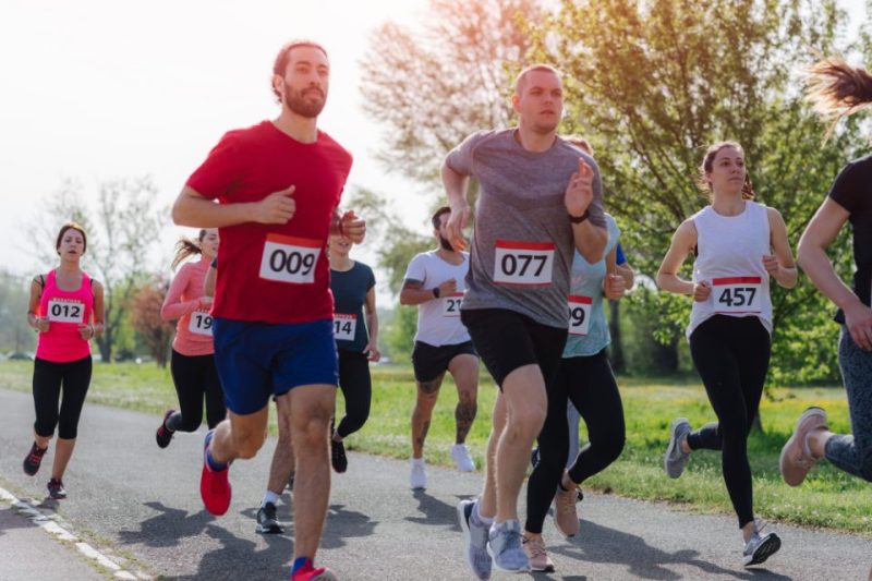 A group of runners running a 5k race.
