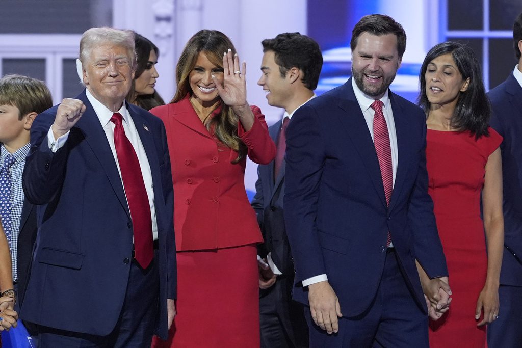 Republican presidential candidate former President Donald Trump, former first lady Melania Trump, Republican vice presidential candidate Sen. JD Vance, R-Ohio, and his wife Usha Vance together on stage at the end of the Republican National Convention, Thursday, July 18, 2024, in Milwaukee. (AP Photo/J. Scott Applewhite)