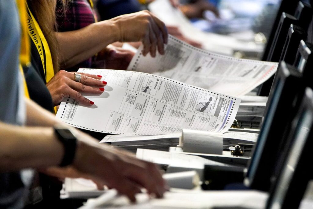 Photo of people voting in PA 2023