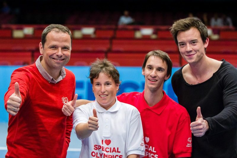 Special Olympics athletes posing for a photo.