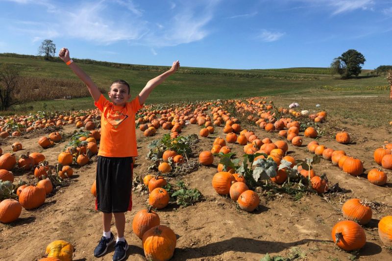 Child at the pumpkin patch - Simmons Farm, Pittsburgh Pennsylvania.