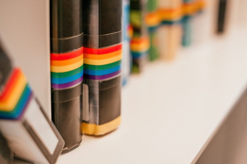 books with rainbows on the binders
