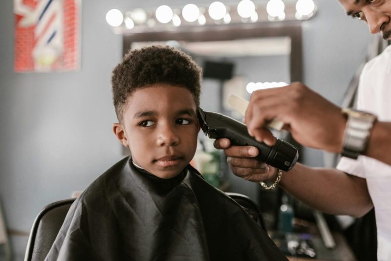 Young boy at the barber.