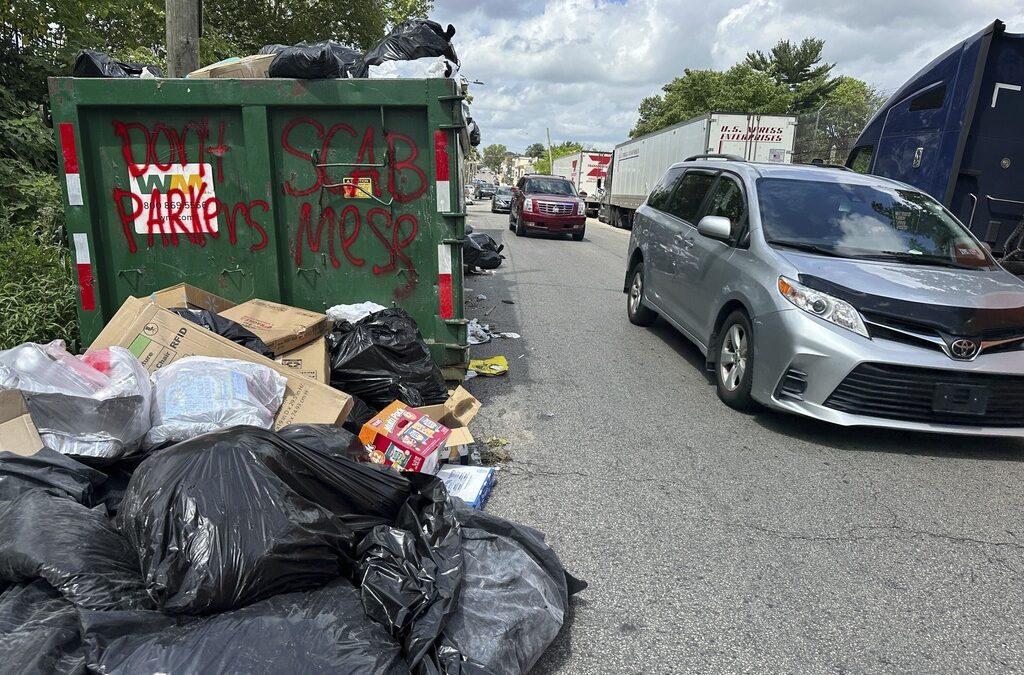 Philadelphia workers and city reach a deal to end strike that halted residential trash pickup