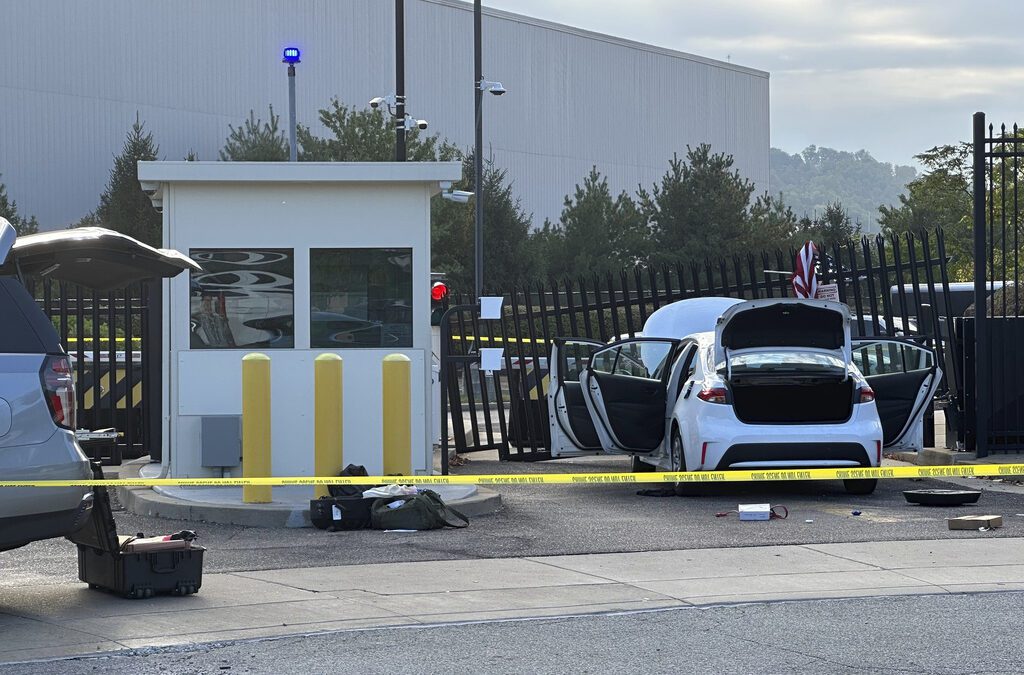 Driver rams car into FBI building gate in Pittsburgh and leaves behind an American flag