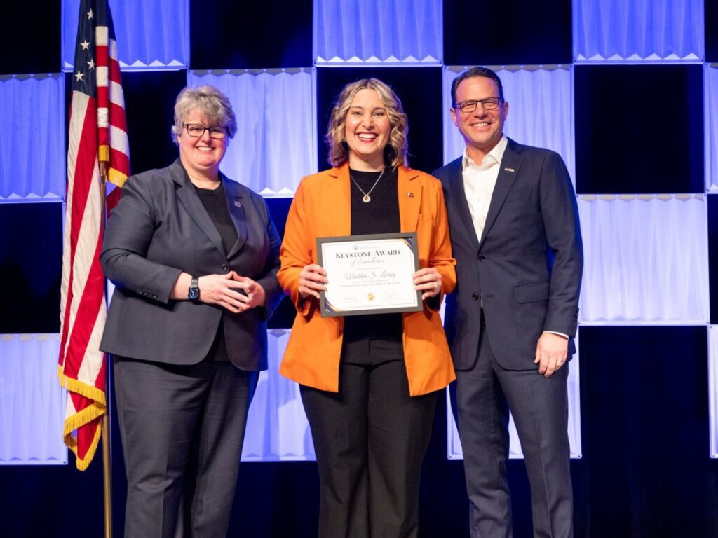 Pennsylvania Gov. Josh Shapiro speaks at the SAS Institute, the state Department of Education’s annual professional development conference, on Dec. 8, 2025, where he and Acting Education Secretary Carrie Rowe announced that Madeline Loring of the Jefferson-Morgan School District was named the 2026 Pennsylvania Teacher of the Year.