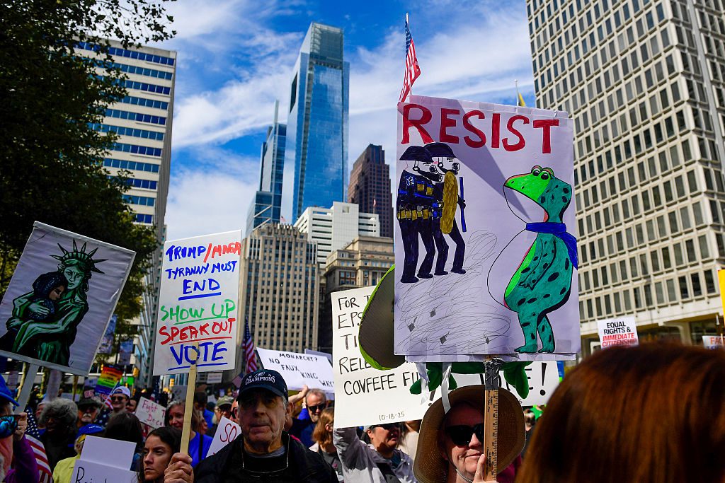 People participate in a "No Kings" national day of protest in Philadelphia, Pennsylvania, on October 18, 2025. From New York to San Francisco, millions of Americans are expected to hit the streets to voice their anger over President Donald Trump's policies at nationwide "No Kings" protests. US-POLITICS-PROTEST