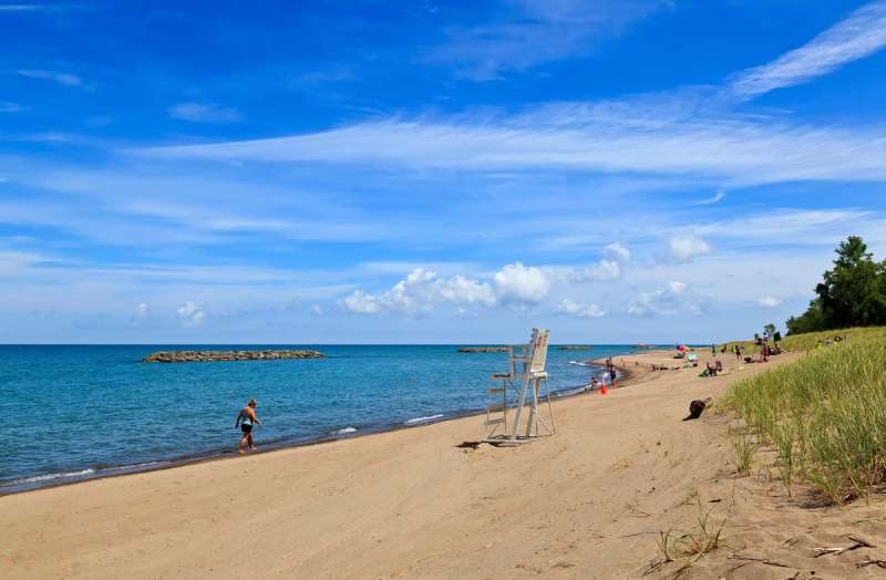 Pennsylvania day trips; Beachgoers enjoy one of the many beaches at Presque Isle State Park in Erie